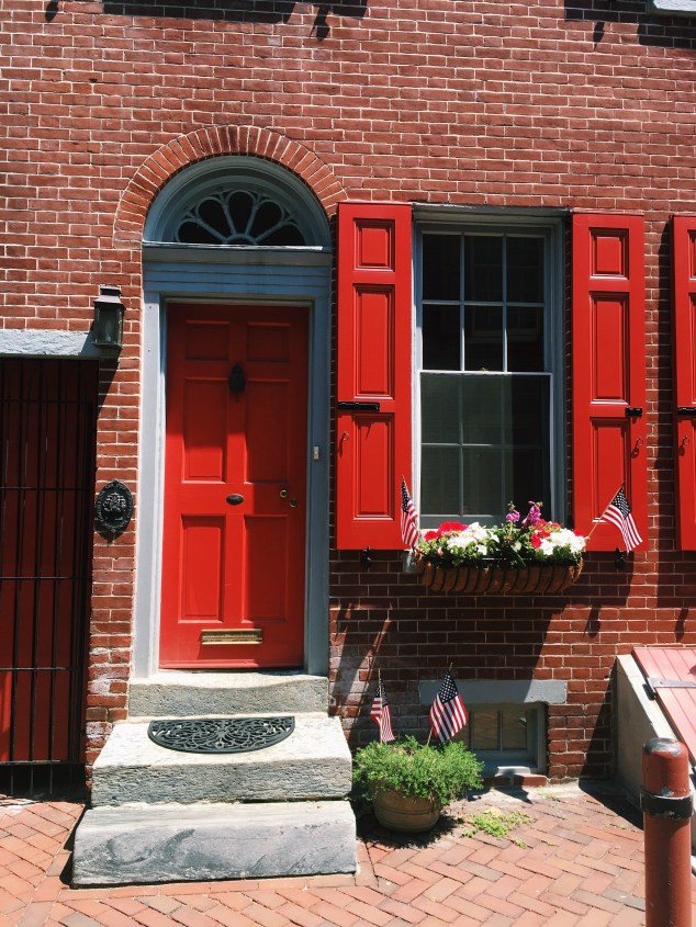 Red door and shutters in Elfreth's Alley, Philadelphia